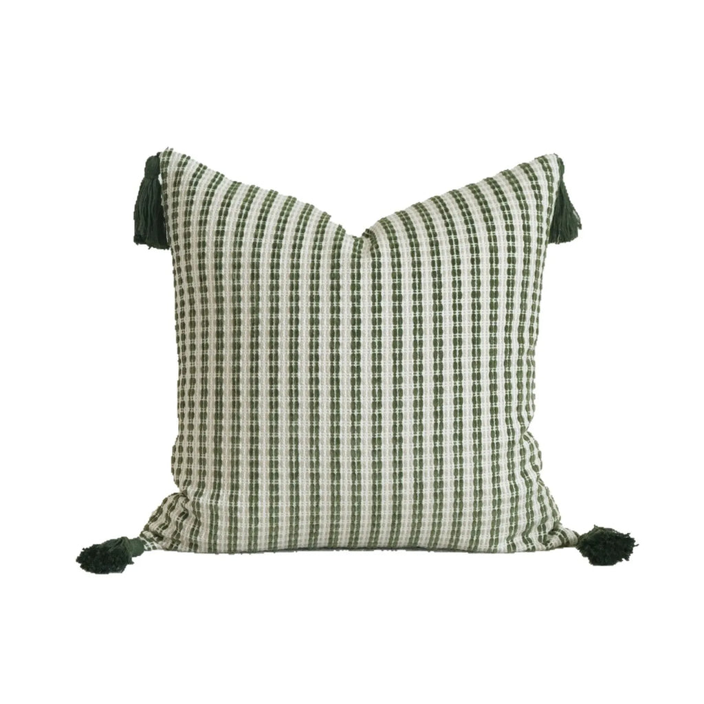 Green botanical pattern hotel sample pillow with tassel detail on linen cotton cover
