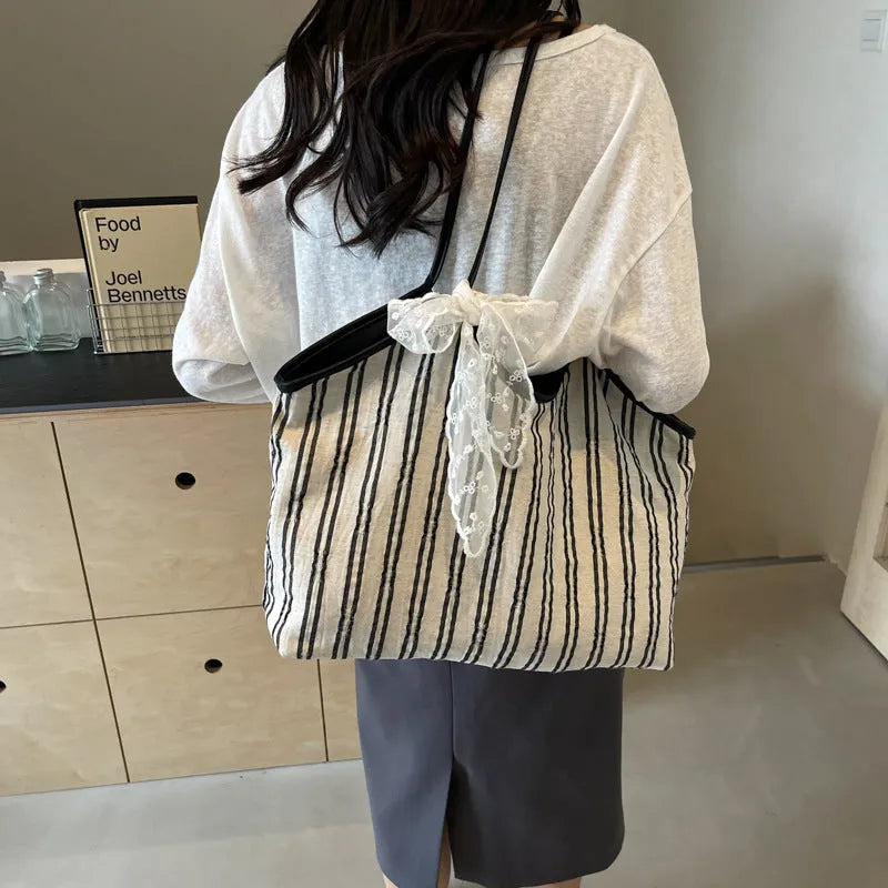 Striped cloth simple Korean style bucket shoulder messenger bag for women with peach skin lining and beige ribbon scarf
