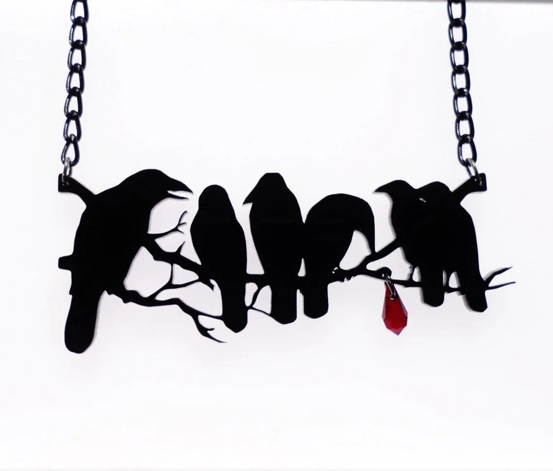 Black gothic crow necklace with detailed bird pendant on cross chain for women