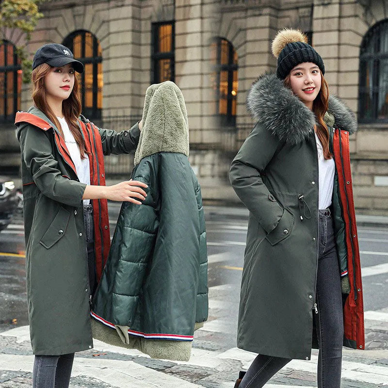 Long beige women's trench coat with cotton-padded fleece construction on a hanger.