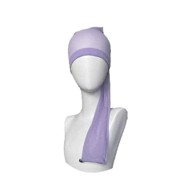 Mesh wig cap in spandex material showing stretch elasticity and breathable construction
