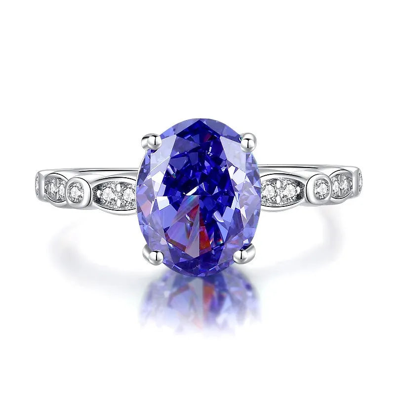 925 sterling silver ring with a heart-shaped Tanzanite colour zircon stone in an ice flower cut.