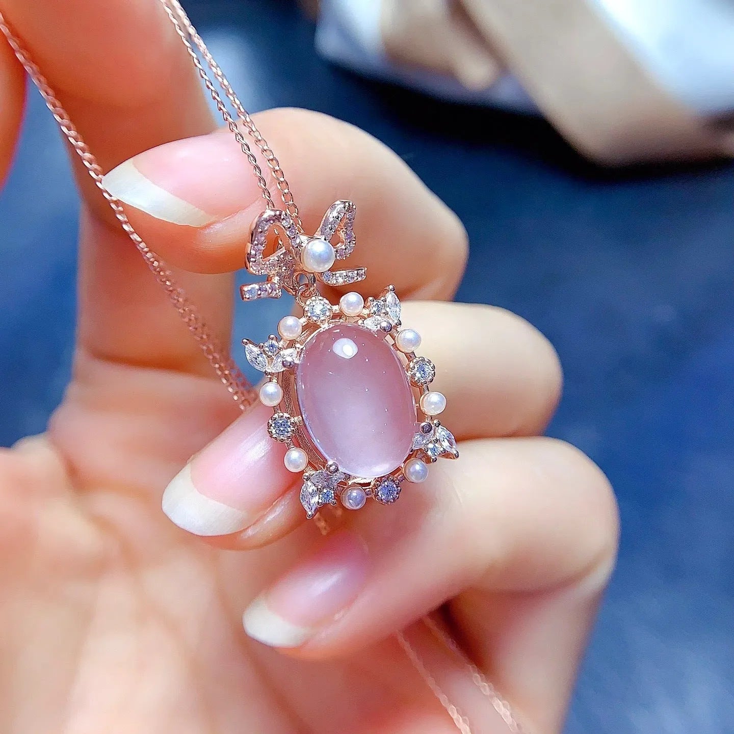 Geometric pink rose quartz pendant necklace with silver setting and rose gold plating on alloy chain