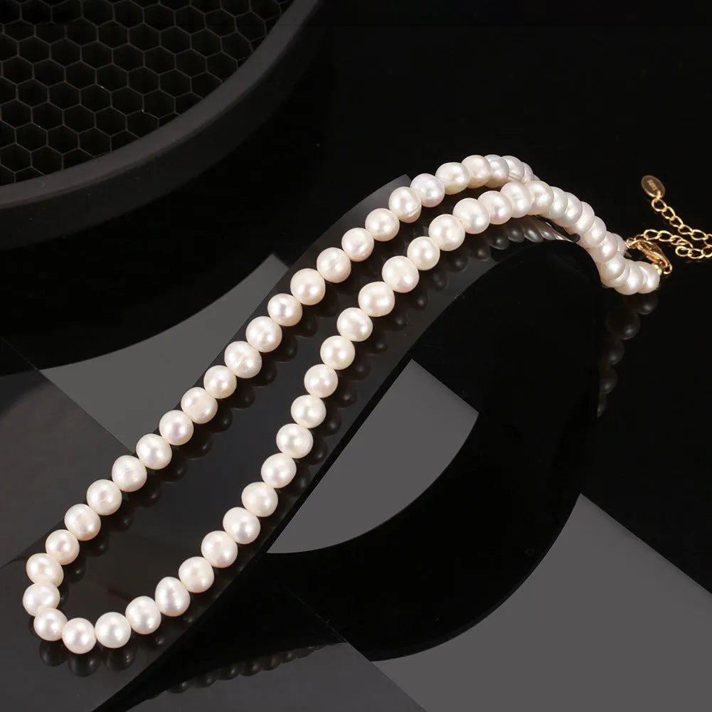 Women's sterling silver necklace with a 6-7mm freshwater pearl on an adjustable chain.