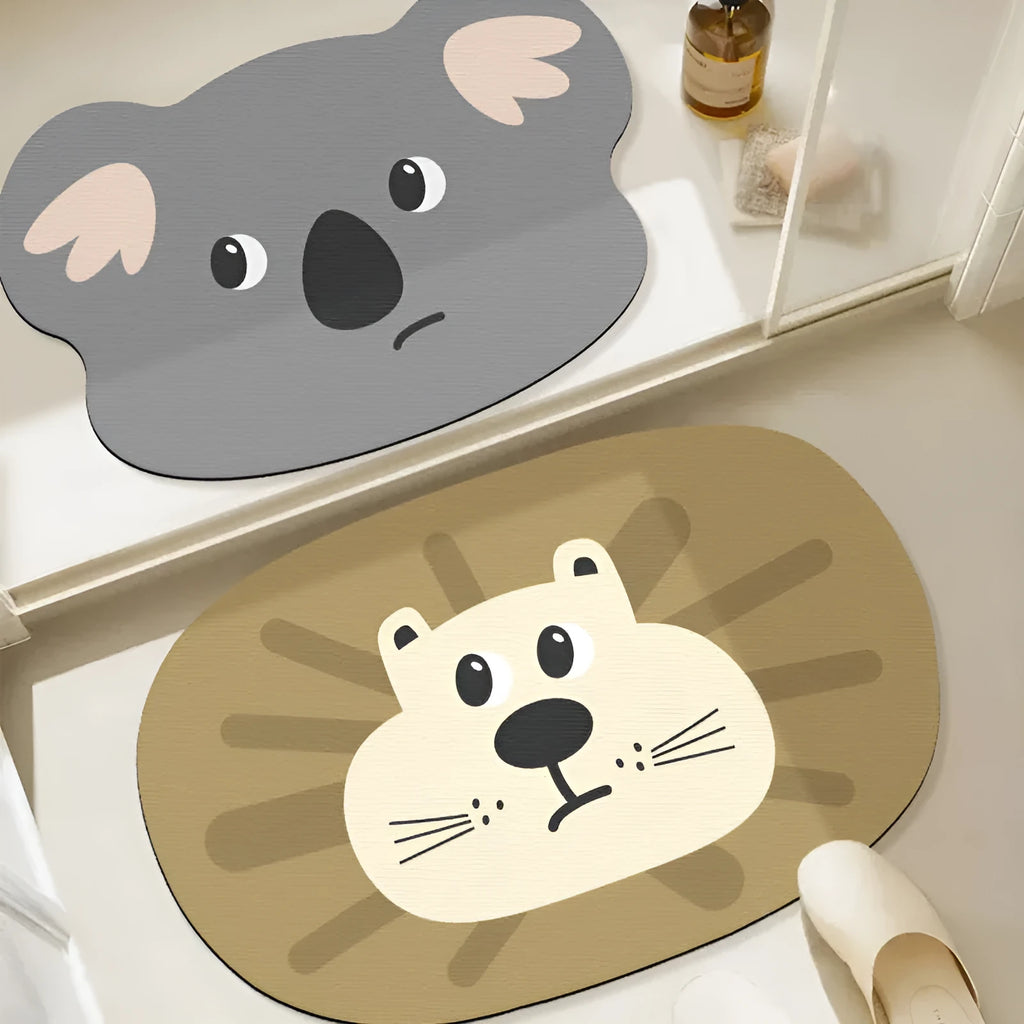 Diatomite bathroom absorbent mat in a cartoon animal design on a bathroom floor.