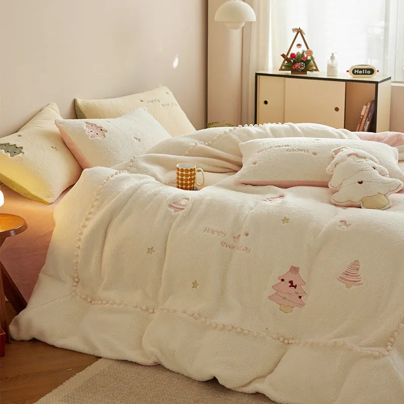 Milk fibre bedding four-piece set with green Christmas tree pattern on duvet cover, sheet, and pillowcases.