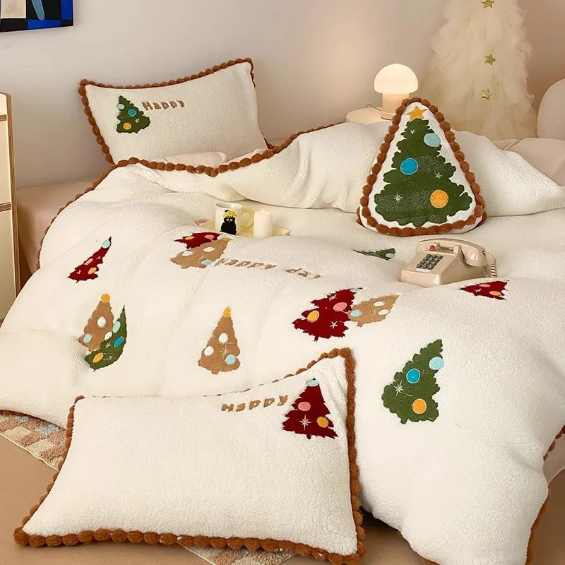 Bright yellow winter Christmas bedding four-piece set with cartoon pattern on a bed, showing fleece-lined quilt cover, sheet, and pillowcases.
