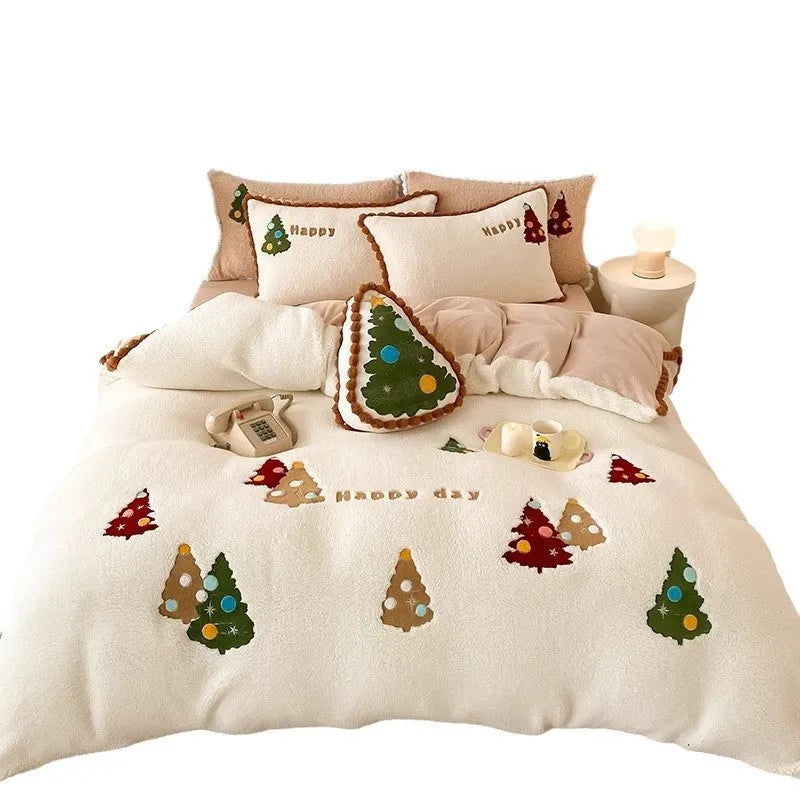 Bright yellow winter Christmas bedding four-piece set with cartoon pattern on a bed, showing fleece-lined quilt cover, sheet, and pillowcases.