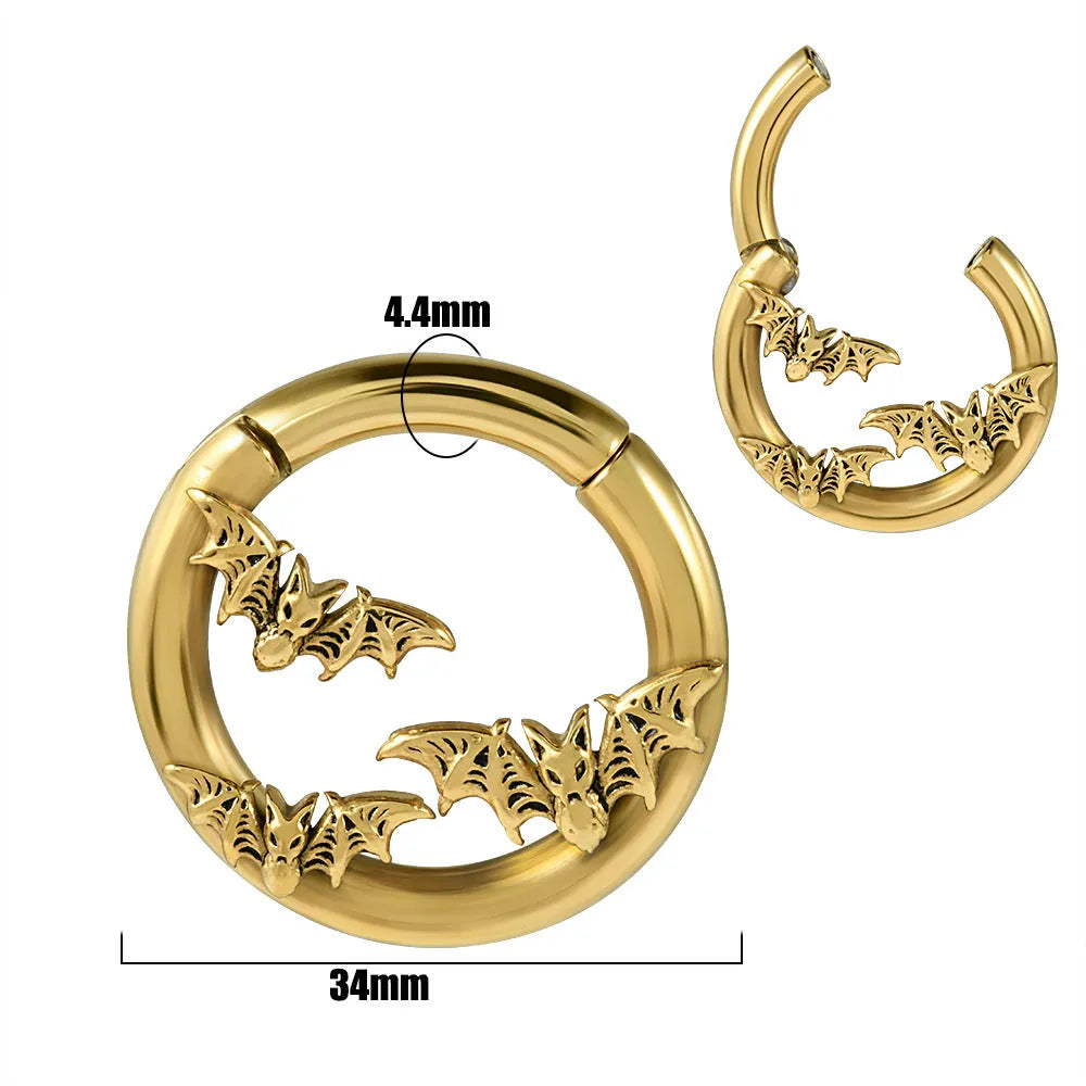 A pair of stainless steel totem pattern earrings with an electroplated finish, shown from the 15 available style options.