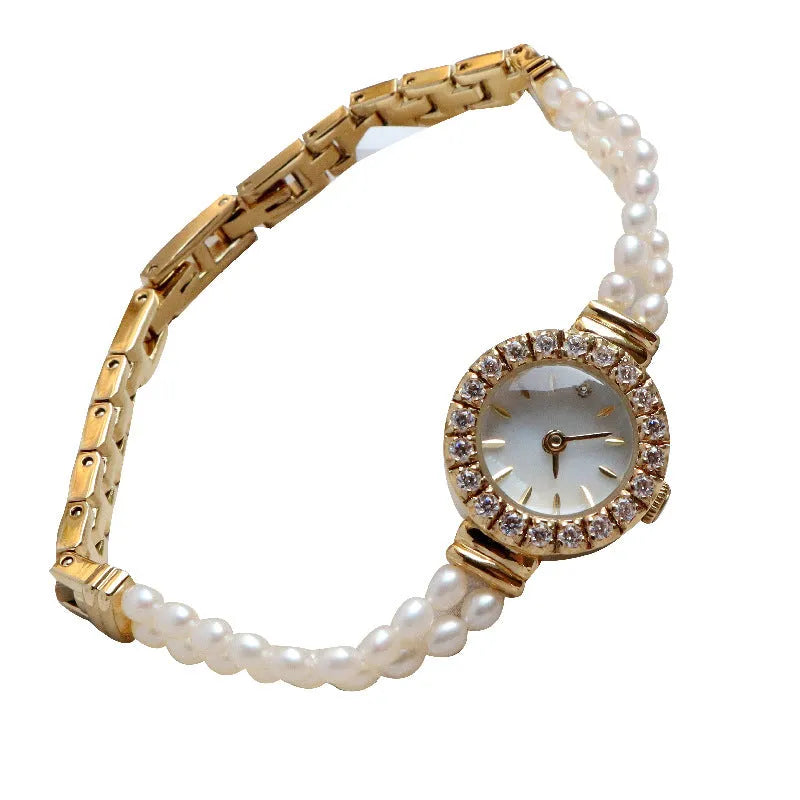 Women's light gold freshwater pearl bracelet watch with round dial and stainless steel strap