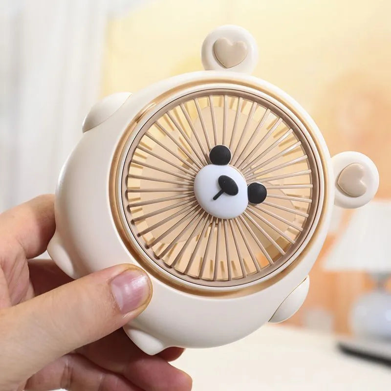 Desktop USB electric fan with cute dog design showing six colour options including bear brown and pink puppy variations