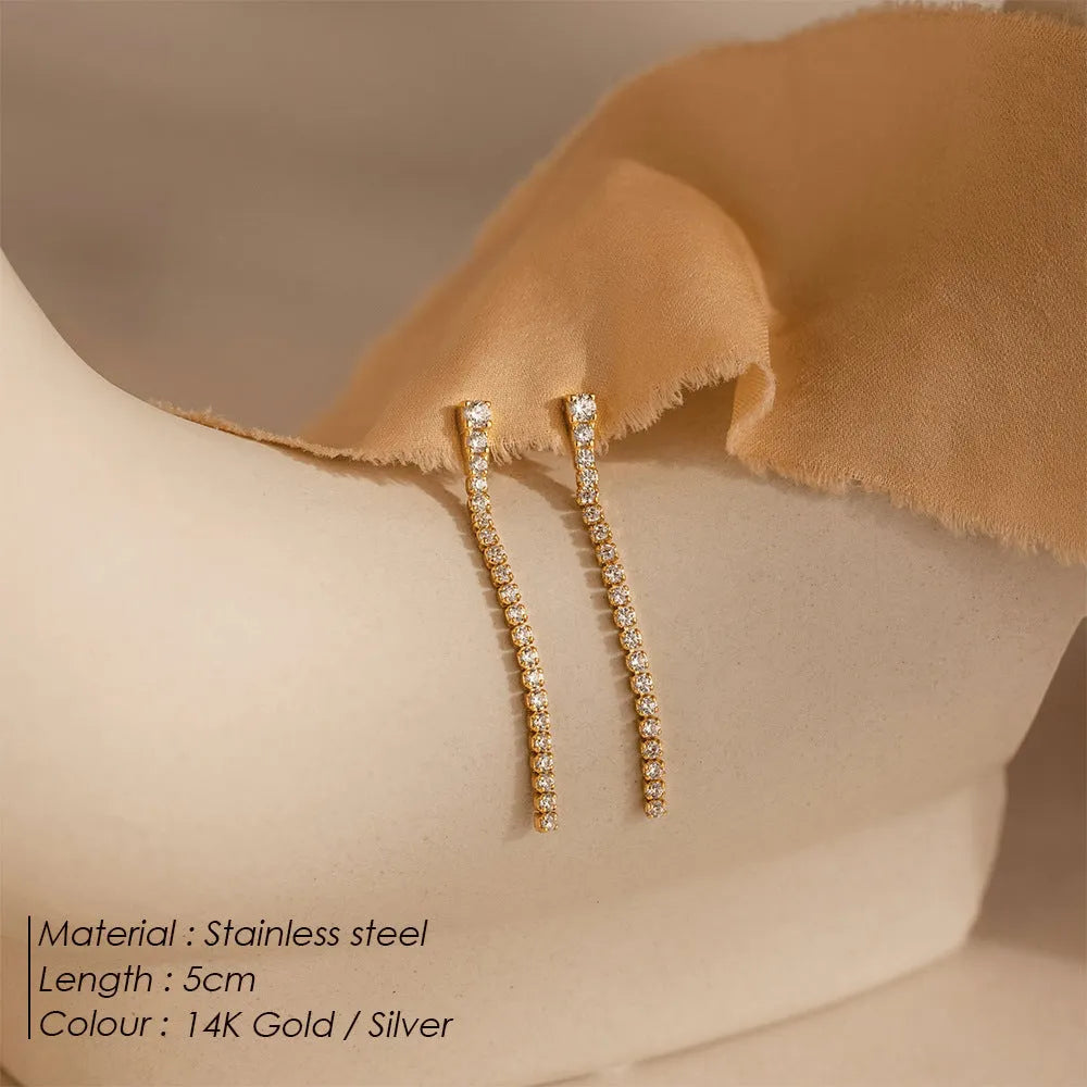 Geometric stainless steel earrings with zircon accents in gold or steel colour