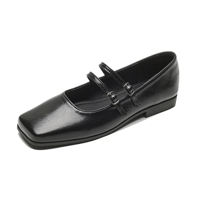Women's silver leather ballet flats with cross-strap buckle and round toe
