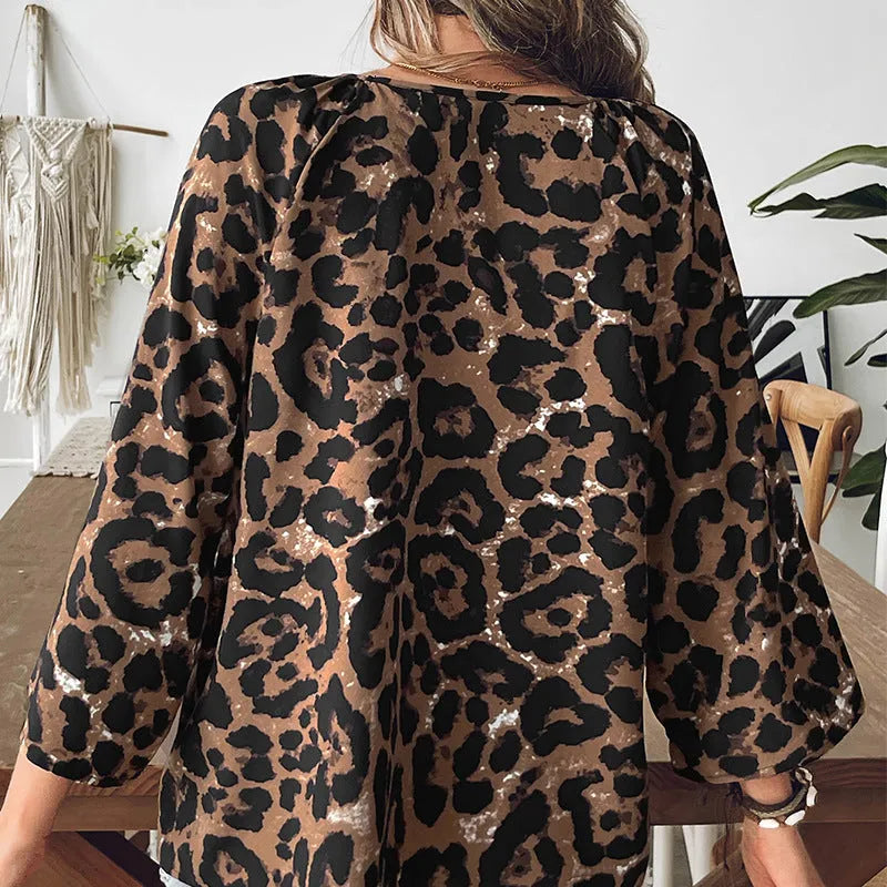 Women's leopard print V-neck pullover top with half sleeves in multicolour pattern