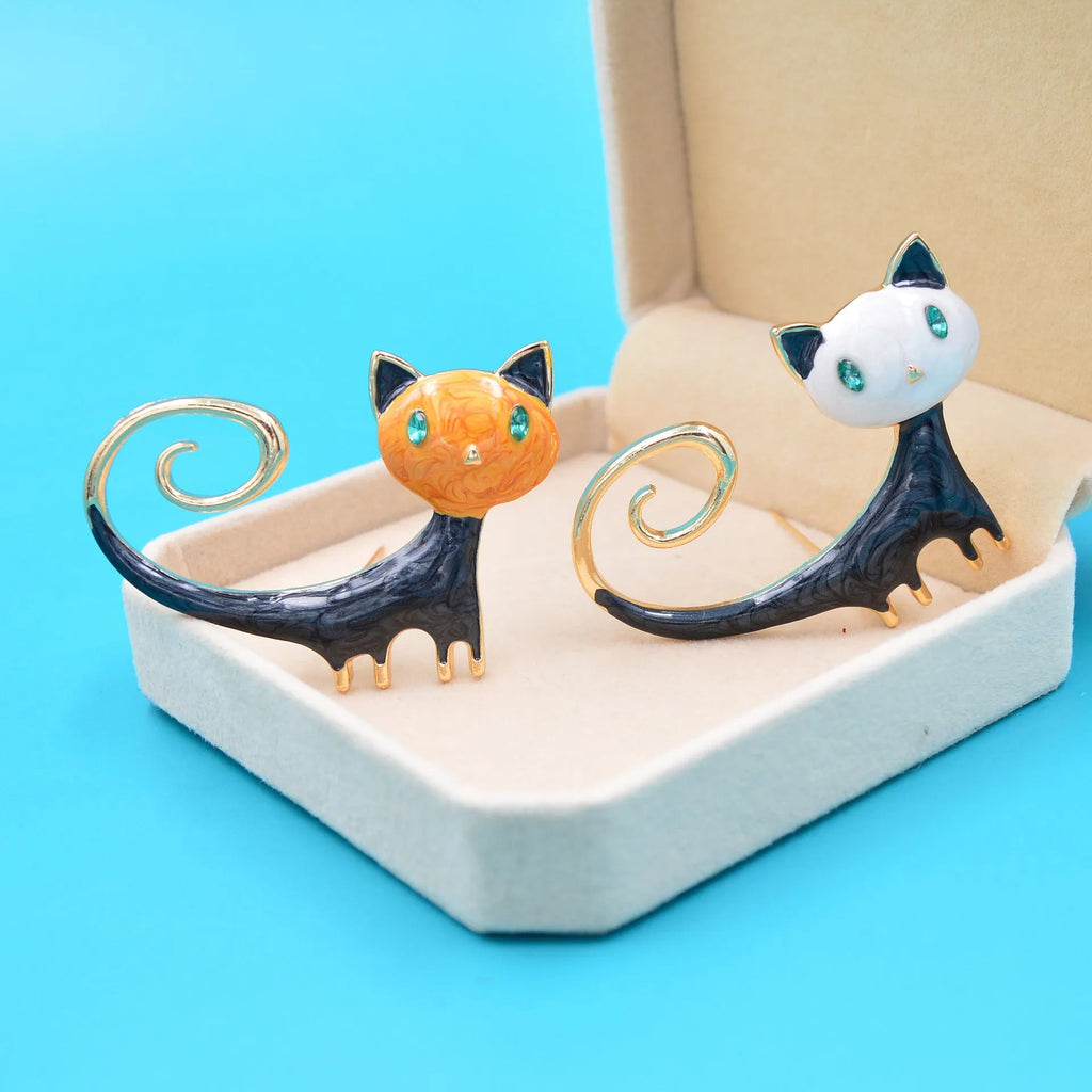 Personalised painted cat tailing up brooch in alloy metal available in white or orange colours