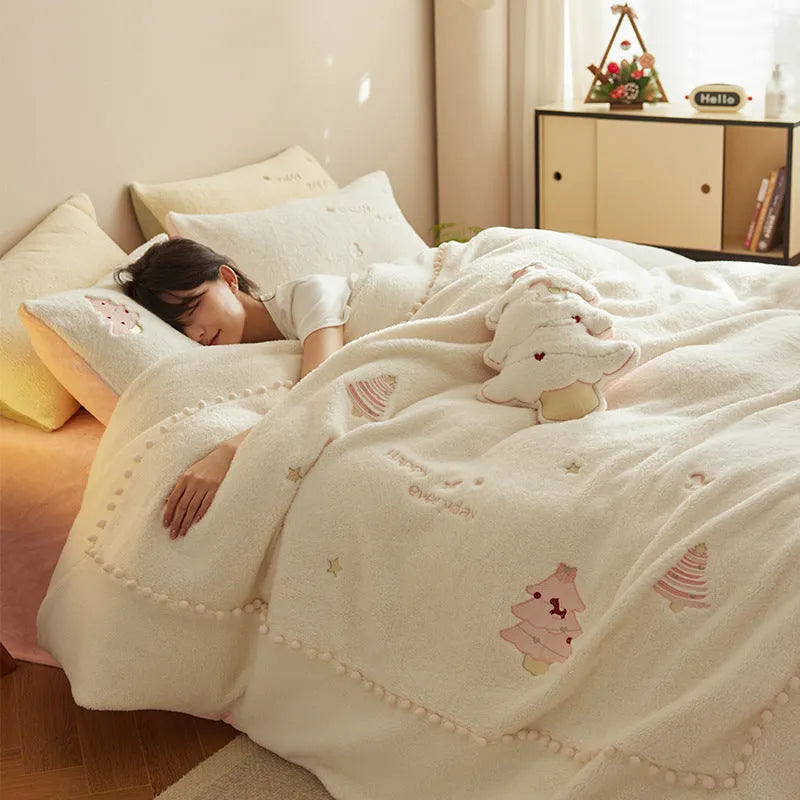 Milk fibre bedding four-piece set with green Christmas tree pattern on duvet cover, sheet, and pillowcases.