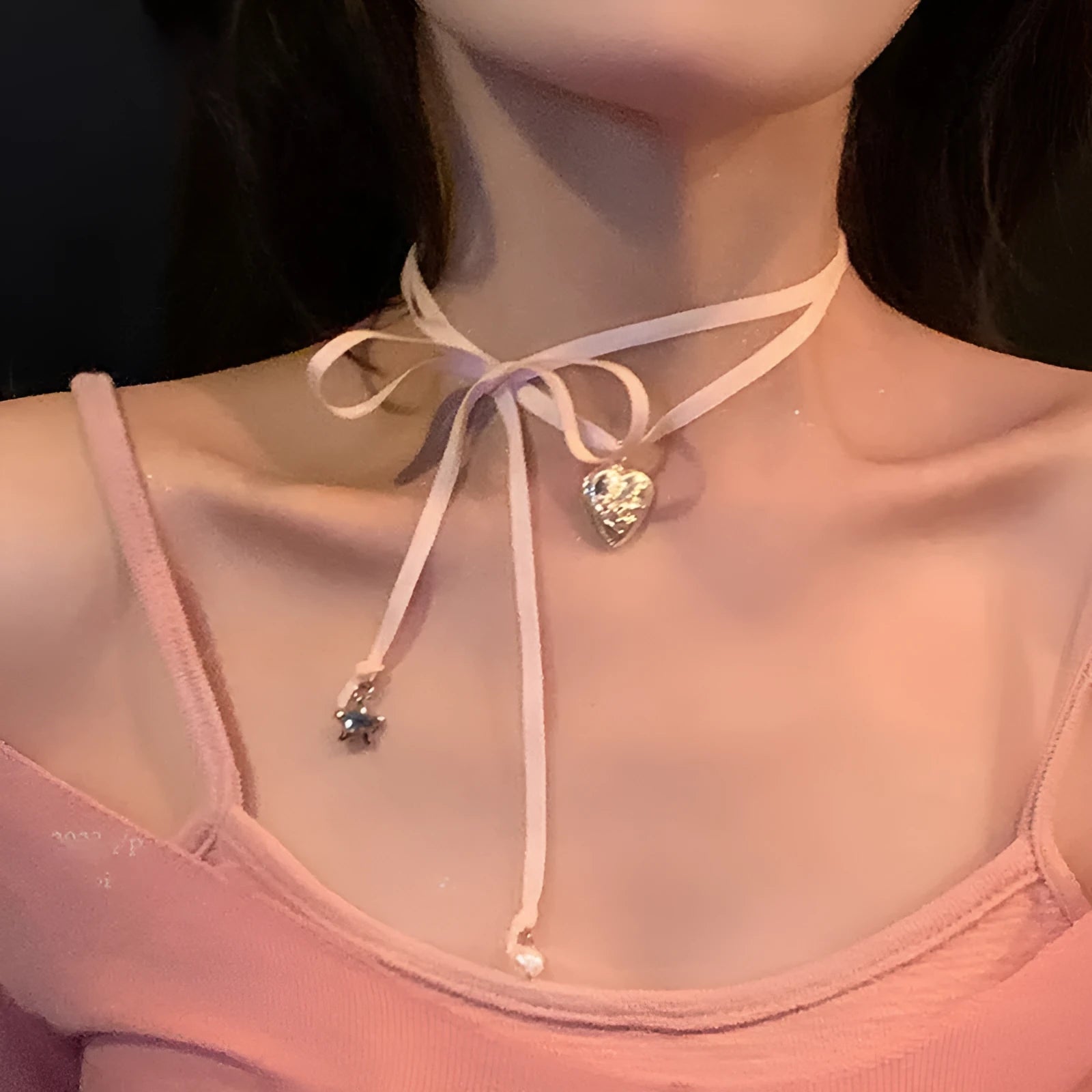 Women's alloy love pendant necklace on a chain, shown in one of 33 electroplated colour options.