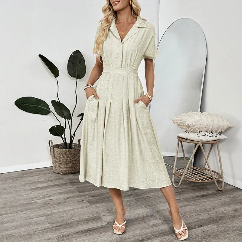 Light green commuter shirt dress with lapel collar and waist-tight fit