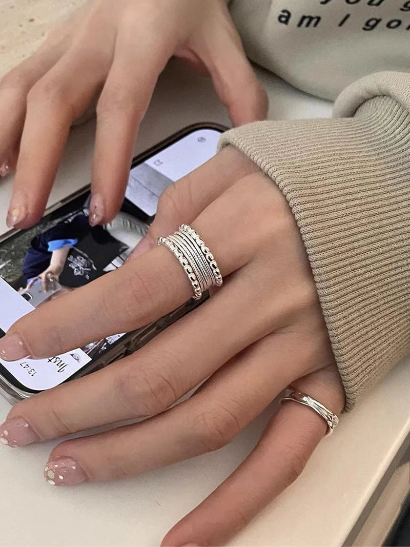 Adjustable geometric copper ring with woven twisted multilayer design for women