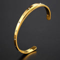 Open-ended adjustable bracelet with inlaid zircon detailing on love theme in rose gold steel colours