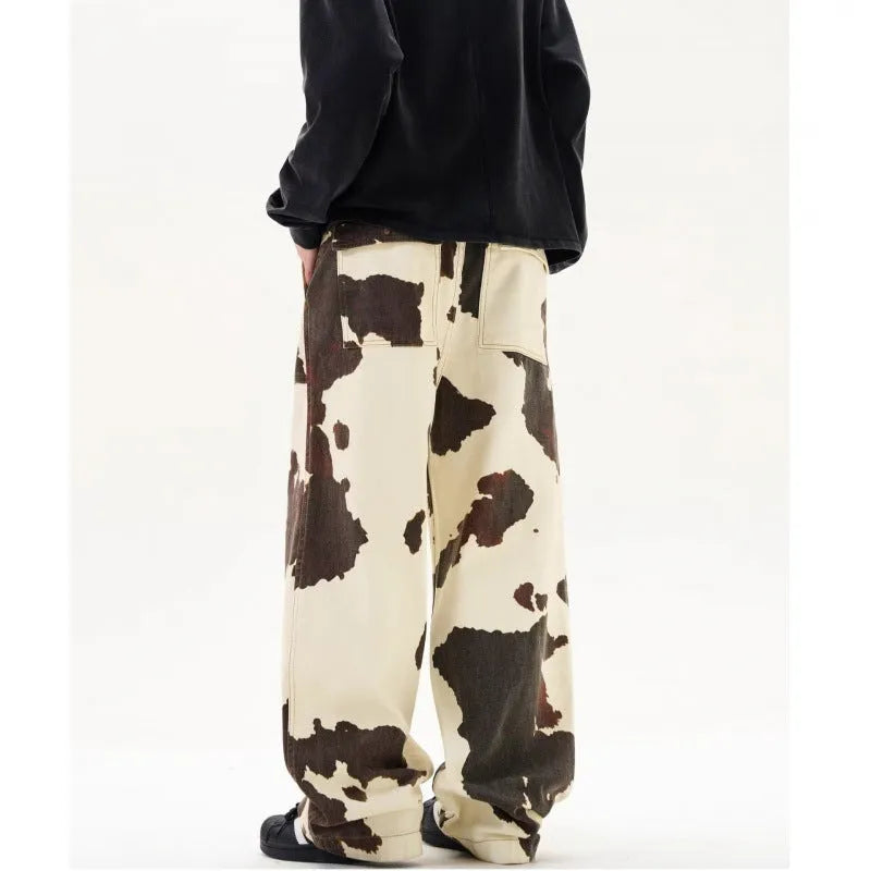 Men's straight-leg casual trousers with a retro cow pattern in a cotton blend fabric.