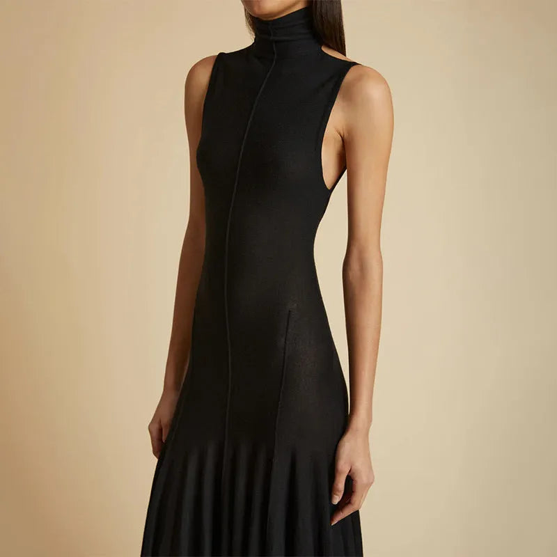 Grey slim-fit women's dress with a half turtleneck neckline and backless design