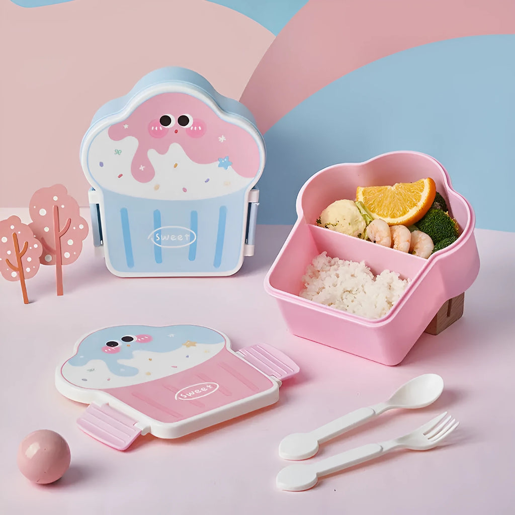 Creative blue and pink ice cream shaped plastic lunch box with spoon and fork on a table