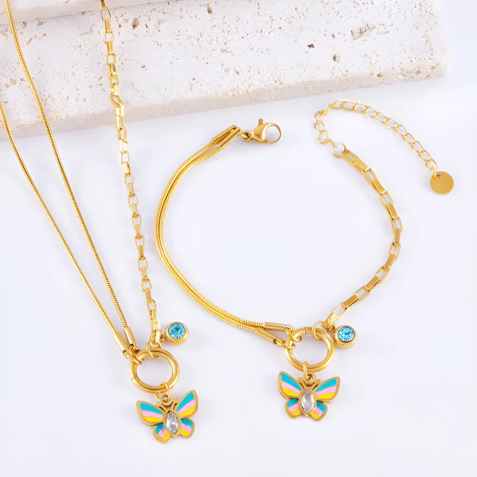 Gold coloured titanium steel necklace and bracelet set with colourful epoxy butterfly pendant