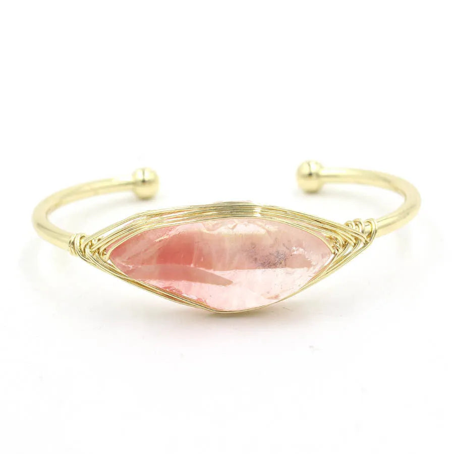 Natural raw gemstone crystal bracelet in ethnic style with simple opening, shown in one of nine colour options.