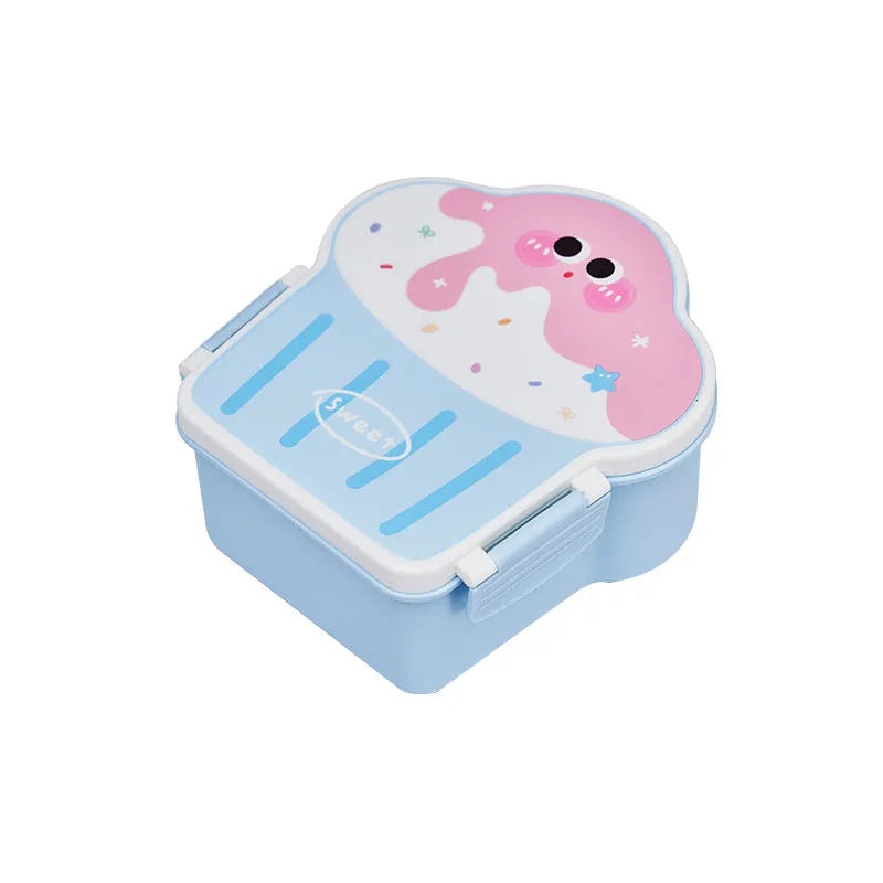 Creative blue and pink ice cream shaped plastic lunch box with spoon and fork on a table
