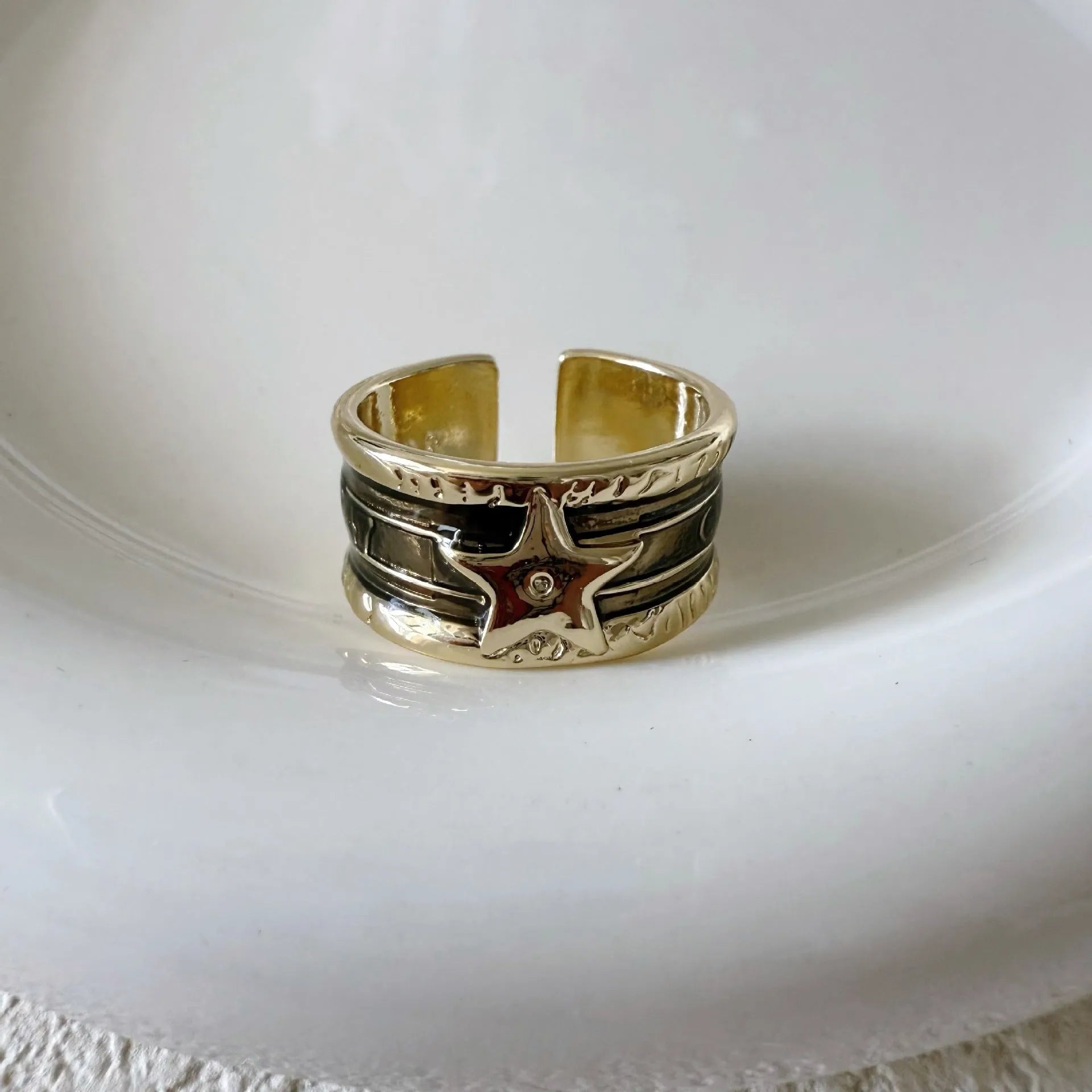 Adjustable geometric copper ring with distressed finish in choice of colours.