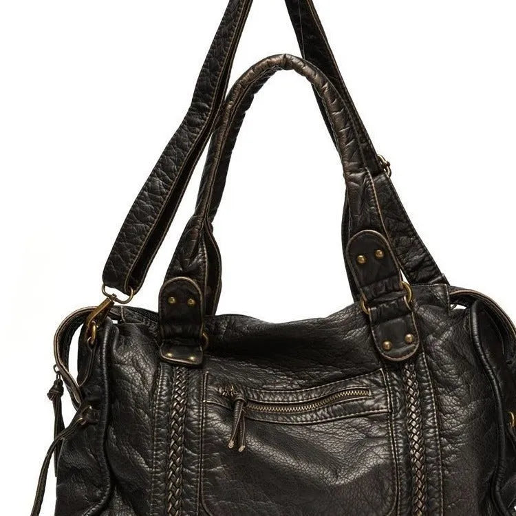 Women's brown retro soft PU messenger bag with woven detail and a single shoulder strap