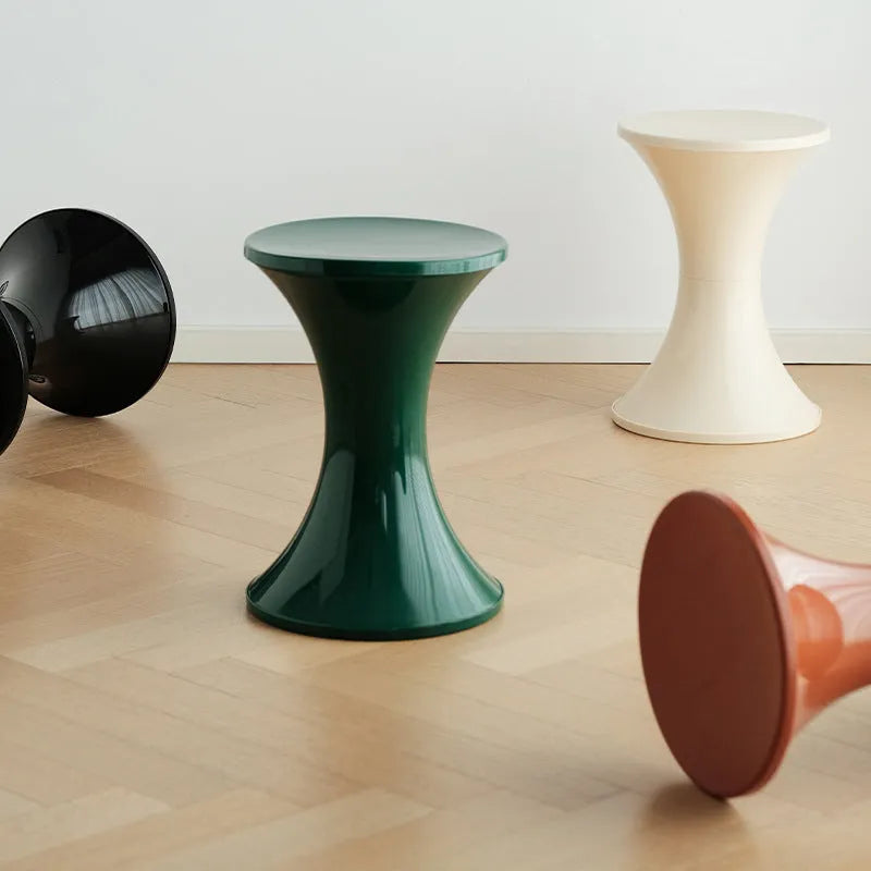 Plastic hourglass style shoe changing stool in available colours