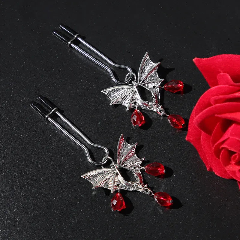 Silver adjustable bat nipple clamp with ruby clip design for intimate jewellery