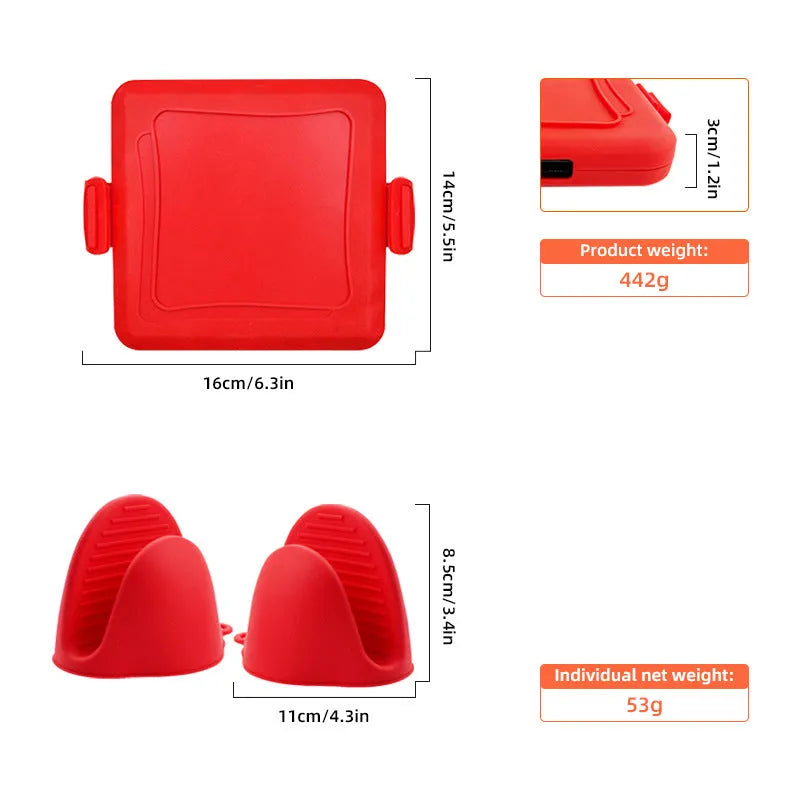 Red silicone baking tray and oven gloves set on a kitchen counter.