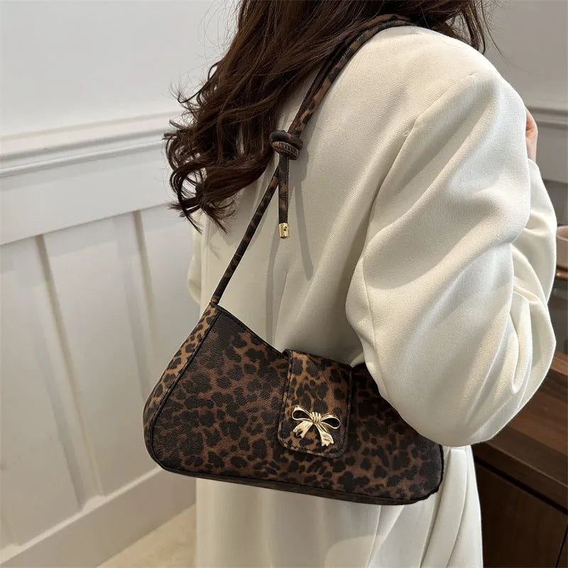 Women's casual PU handbag with sandwich pocket in brown colour showing 27cm dimensions