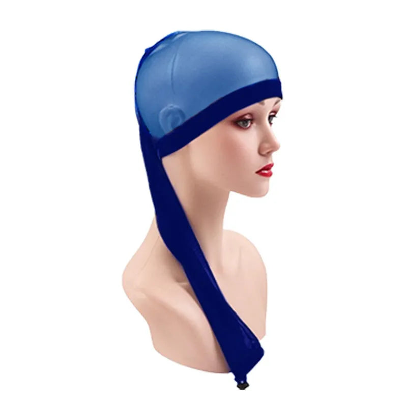 Mesh wig cap in spandex material showing stretch elasticity and breathable construction