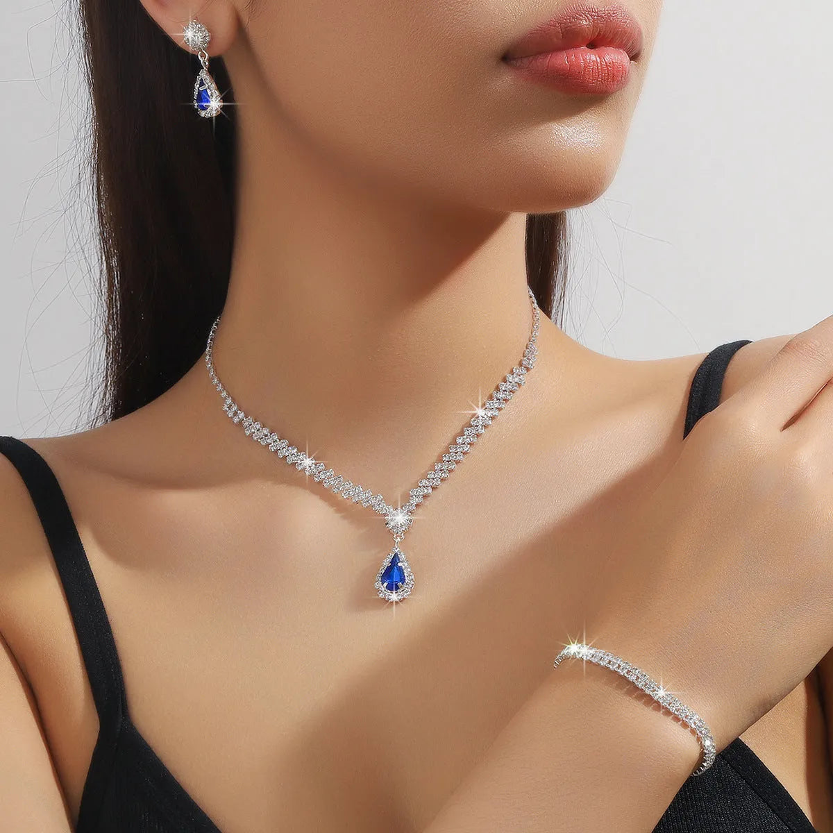 Claw chain rhinestone jewellery set with water drop design in multiple colour options