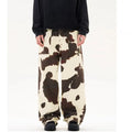 Men's straight-leg casual trousers with a retro cow pattern in a cotton blend fabric.