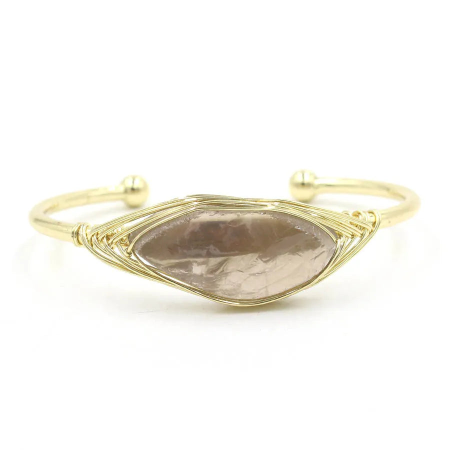 Natural raw gemstone crystal bracelet in ethnic style with simple opening, shown in one of nine colour options.