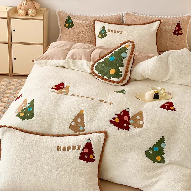 Bright yellow winter Christmas bedding four-piece set with cartoon pattern on a bed, showing fleece-lined quilt cover, sheet, and pillowcases.