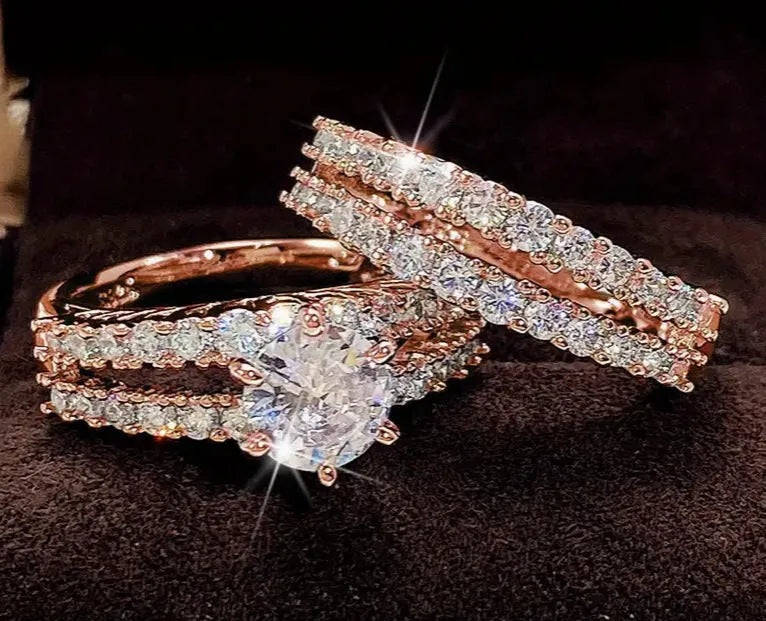 2-in-1 women's fashion ring set with fully-jewelled geometric and round designs in gold, rose gold, and silver colours