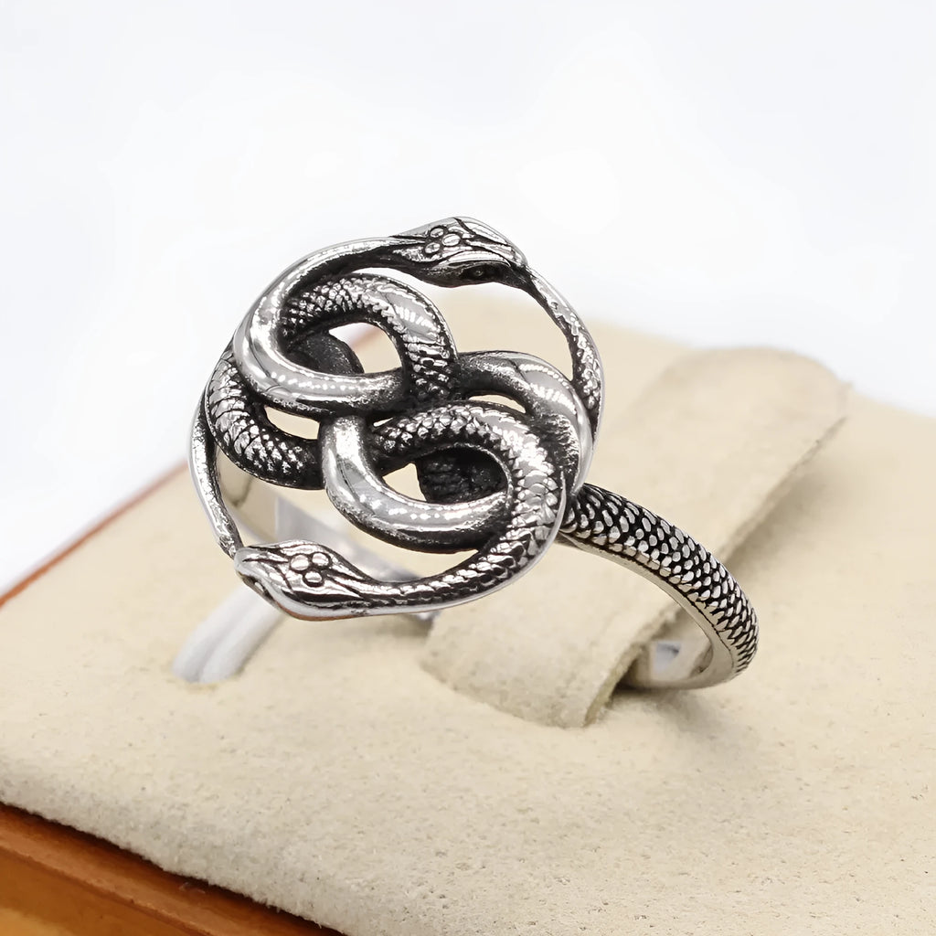Titanium steel retro double snake ring in steel colour shown on finger