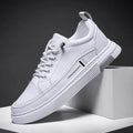Men's white low-top skateboard shoes with elastic band and round toe stitching details