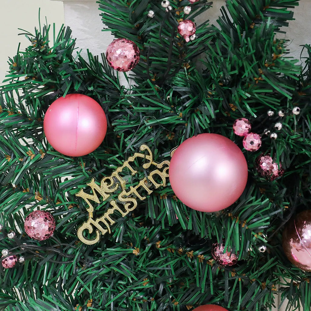 2.7 metre pink artificial rattan Christmas vine decoration with small fruit accents and LED lights