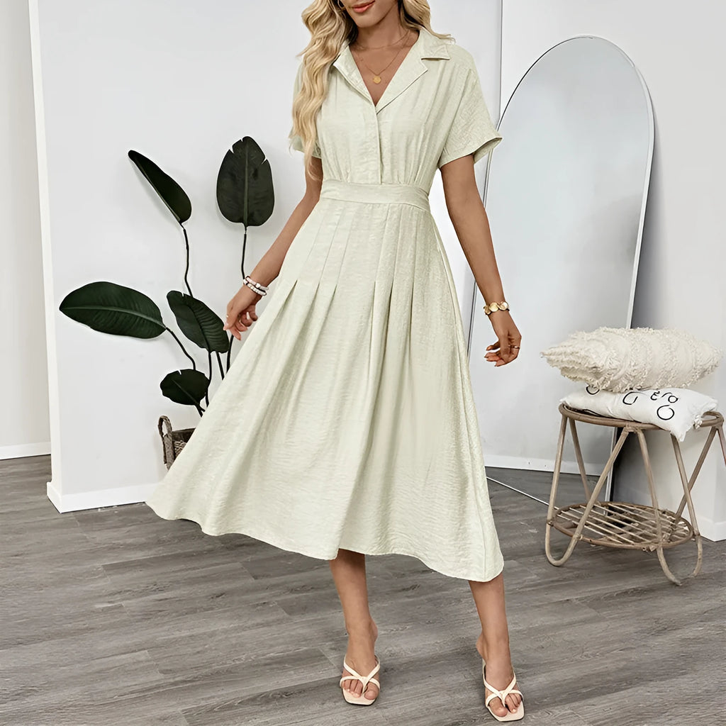 Light green commuter shirt dress with lapel collar and waist-tight fit