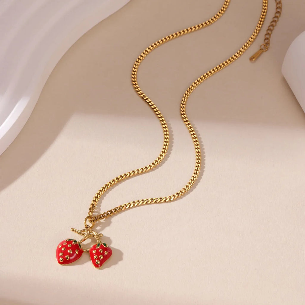 Strawberry-shaped alloy pendant necklace on stainless steel chain in red or white powder gradient colours