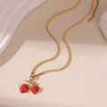 Strawberry-shaped alloy pendant necklace on stainless steel chain in red or white powder gradient colours