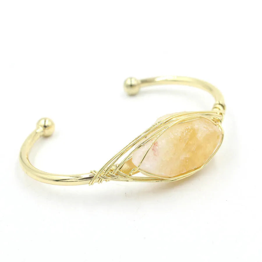 Natural raw gemstone crystal bracelet in ethnic style with simple opening, shown in one of nine colour options.