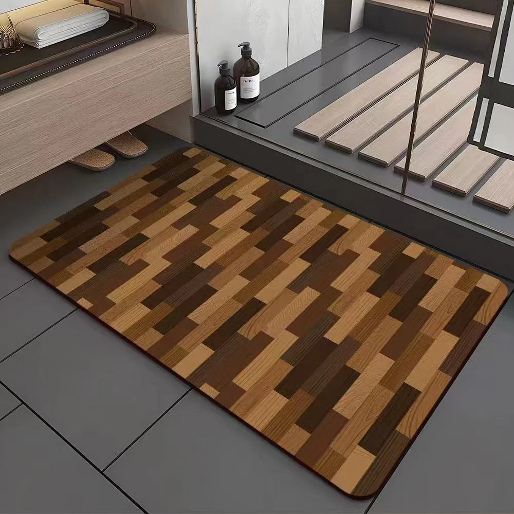 Square diatomite bathroom floor mat with wood grain geometric pattern in a bathroom setting.